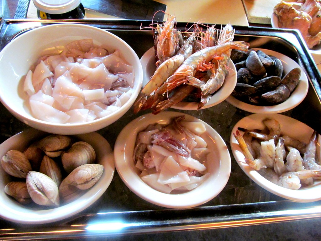 Mariscos paella ingredients: Prawns, Squid, Clams, Mussels 