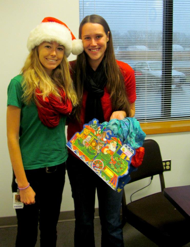 My co-worker Ashley and I during Secret Santa 2012. She's the one who is having a baby any second now!